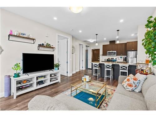 310-118 King Street E, Hamilton, ON - Indoor Photo Showing Living Room