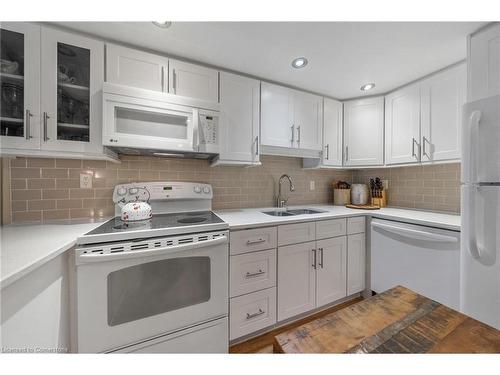 204-1270 Maple Crossing Boulevard, Burlington, ON - Indoor Photo Showing Kitchen With Double Sink