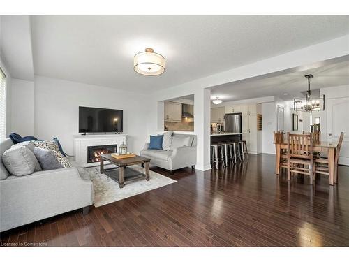 119-1035 Victoria Road S, Guelph, ON - Indoor Photo Showing Living Room With Fireplace