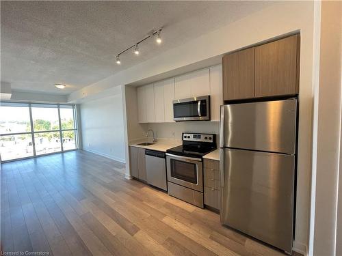 B407-5240 Dundas Street, Burlington, ON - Indoor Photo Showing Kitchen With Stainless Steel Kitchen