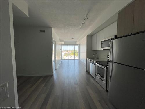 B407-5240 Dundas Street, Burlington, ON - Indoor Photo Showing Kitchen With Stainless Steel Kitchen