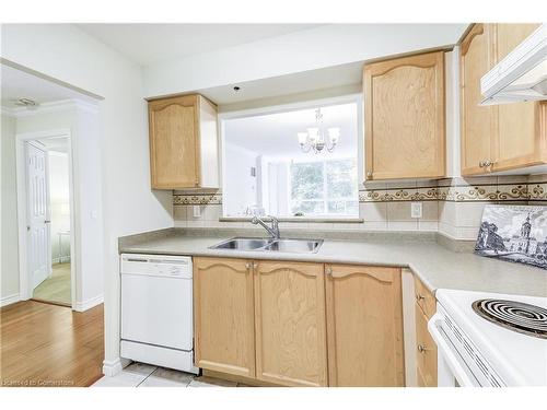 1308-100 Burloak Drive, Burlington, ON - Indoor Photo Showing Kitchen With Double Sink