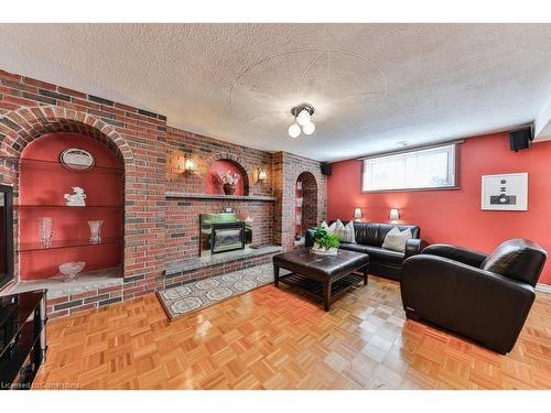 56 Church Street, Stoney Creek, ON - Indoor Photo Showing Living Room With Fireplace