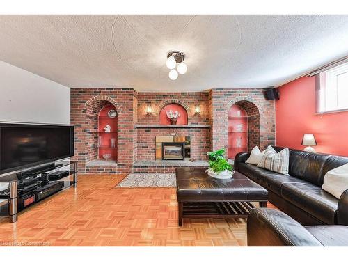 56 Church Street, Stoney Creek, ON - Indoor Photo Showing Living Room With Fireplace