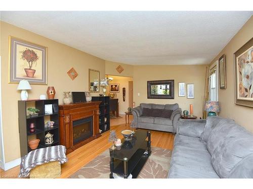 33 Fielding Crescent, Hamilton, ON - Indoor Photo Showing Living Room With Fireplace