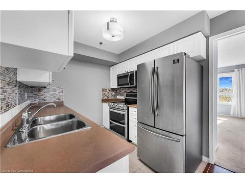 1204-330 Prince Charles Drive S, Welland, ON - Indoor Photo Showing Kitchen With Stainless Steel Kitchen With Double Sink