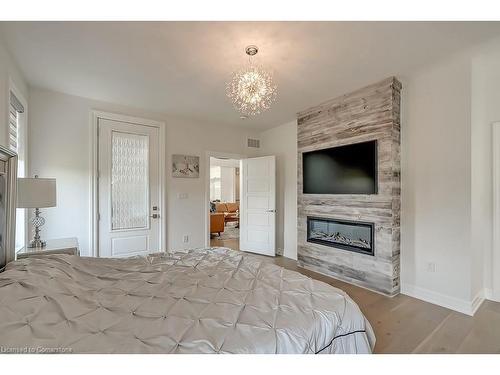 23 Whitcombe Way, Morriston, ON - Indoor With Fireplace