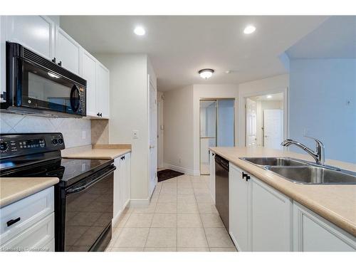 709-399 Elizabeth Street, Burlington, ON - Indoor Photo Showing Kitchen With Double Sink