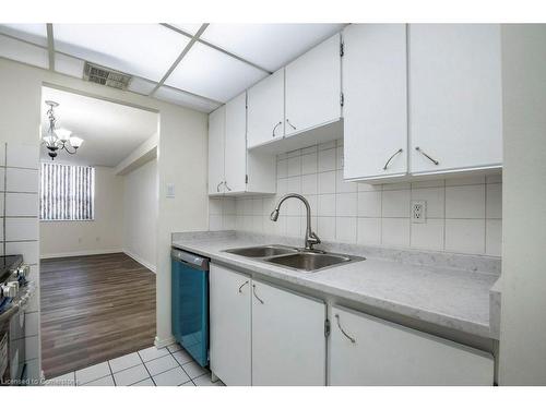 712-4 Lisa Street, Brampton, ON - Indoor Photo Showing Kitchen With Double Sink