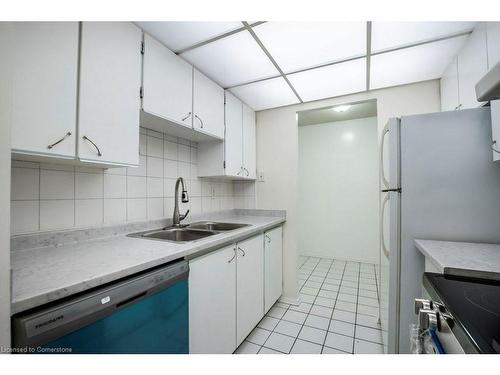 712-4 Lisa Street, Brampton, ON - Indoor Photo Showing Kitchen With Double Sink