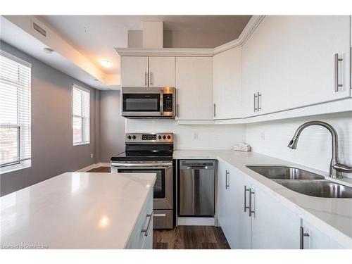 302-4 Barton Street, Hamilton, ON - Indoor Photo Showing Kitchen With Double Sink With Upgraded Kitchen