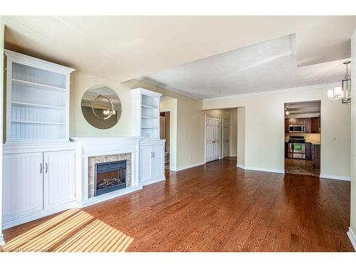 801-3000 Creekside Drive, Dundas, ON - Indoor Photo Showing Living Room With Fireplace