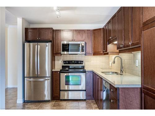 801-3000 Creekside Drive, Dundas, ON - Indoor Photo Showing Kitchen With Stainless Steel Kitchen With Double Sink