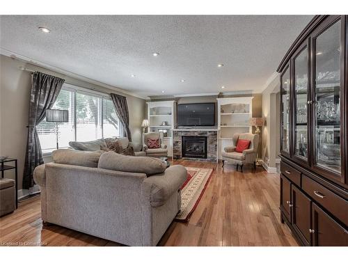 989 North Shore Boulevard W, Burlington, ON - Indoor Photo Showing Living Room With Fireplace