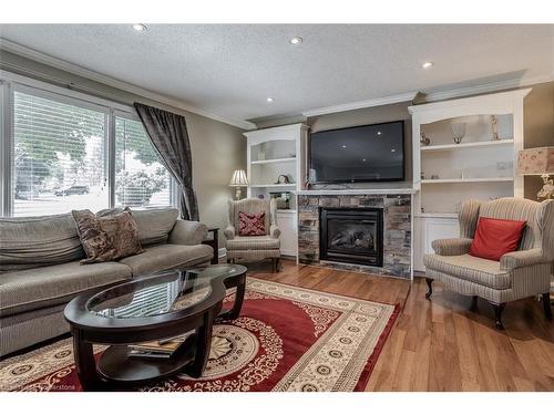 989 North Shore Boulevard W, Burlington, ON - Indoor Photo Showing Living Room With Fireplace