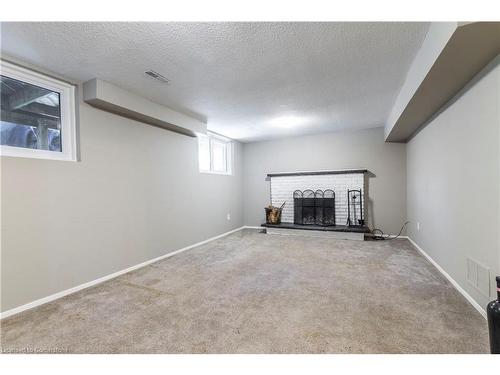 1216 Consort Crescent, Burlington, ON - Indoor Photo Showing Other Room With Fireplace