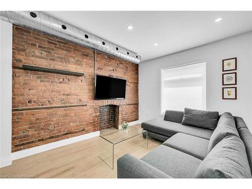 198 Dundurn Street S, Hamilton, ON - Indoor Photo Showing Living Room With Fireplace