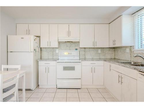 25 Brant Street, Hamilton, ON - Indoor Photo Showing Kitchen With Double Sink