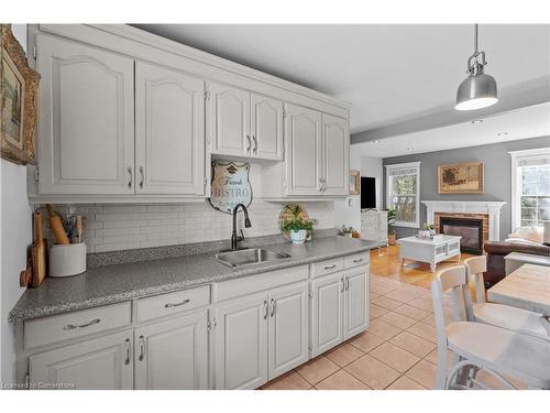 48 Sandra Street, Brantford, ON - Indoor Photo Showing Kitchen With Fireplace