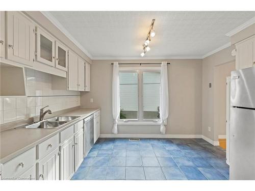 8169 Michael Street, Niagara Falls, ON - Indoor Photo Showing Kitchen With Double Sink