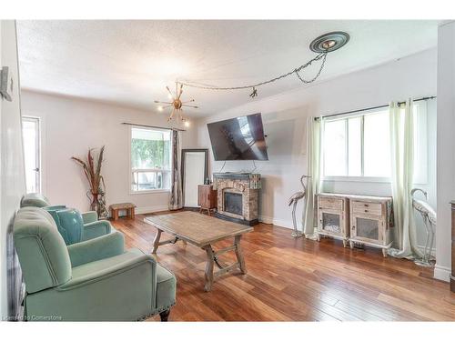 15 Agnes Street, Hamilton, ON - Indoor Photo Showing Living Room With Fireplace