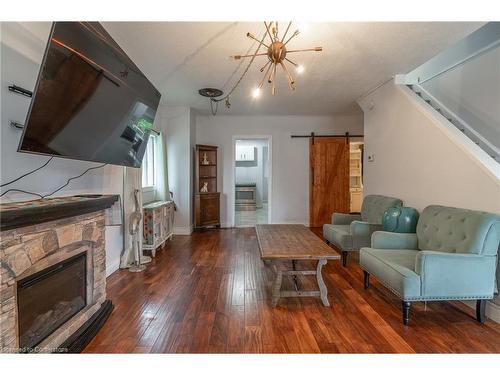 15 Agnes Street, Hamilton, ON - Indoor Photo Showing Living Room With Fireplace