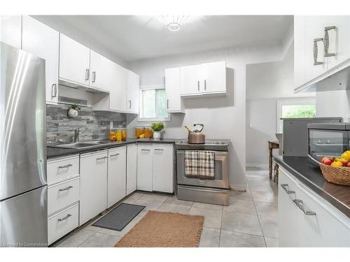 15 Agnes Street, Hamilton, ON - Indoor Photo Showing Kitchen With Double Sink