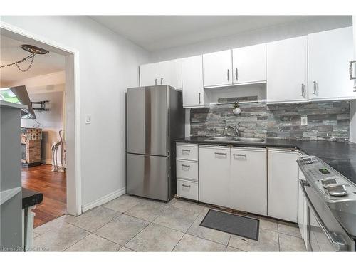 15 Agnes Street, Hamilton, ON - Indoor Photo Showing Kitchen With Double Sink