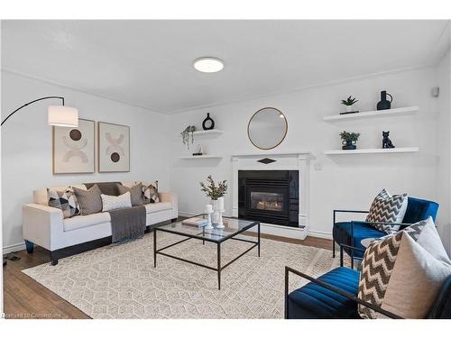 41 Highbury Drive, Stoney Creek, ON - Indoor Photo Showing Living Room With Fireplace