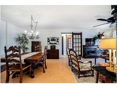 501-9 Grant Boulevard, Dundas, ON - Indoor Photo Showing Dining Room With Fireplace