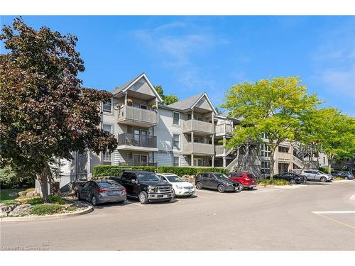 321-2040 Cleaver Avenue, Burlington, ON - Outdoor With Balcony With Facade