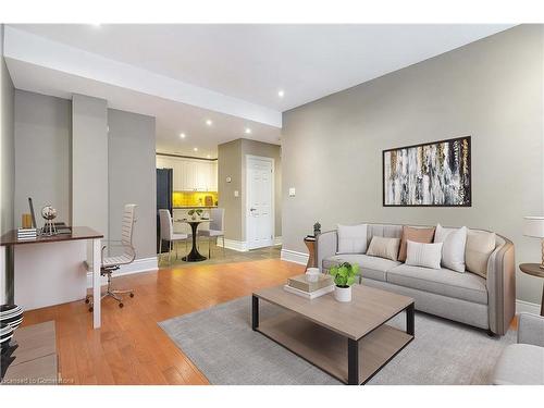 206-283 King Street E, Hamilton, ON - Indoor Photo Showing Living Room