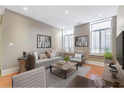 206-283 King Street E, Hamilton, ON - Indoor Photo Showing Living Room