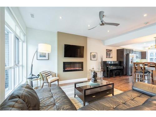 4 Concord Place, Grimsby, ON - Indoor Photo Showing Living Room With Fireplace