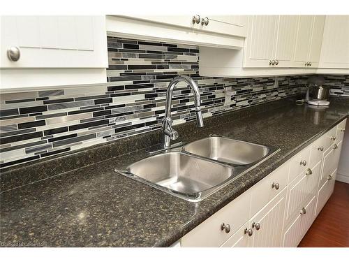 101-1968 Main Street W, Hamilton, ON - Indoor Photo Showing Kitchen With Double Sink