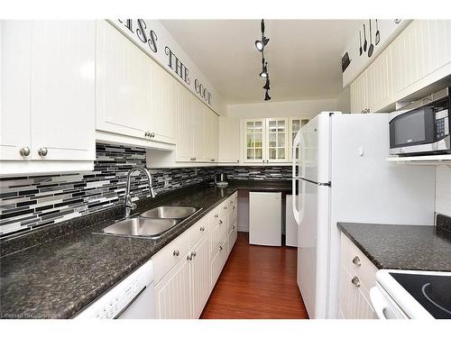 101-1968 Main Street W, Hamilton, ON - Indoor Photo Showing Kitchen With Double Sink