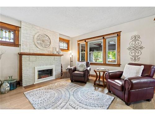 369 Queenston Street, St. Catharines, ON - Indoor Photo Showing Living Room With Fireplace