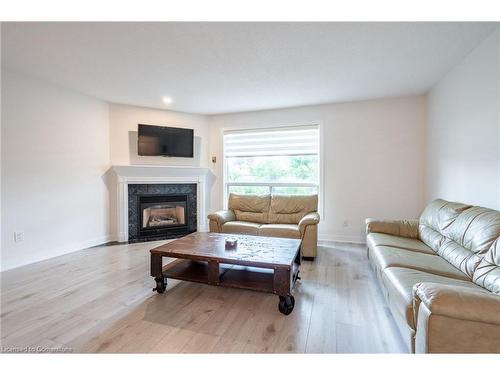 11-384 Limeridge Road E, Hamilton, ON - Indoor Photo Showing Living Room With Fireplace