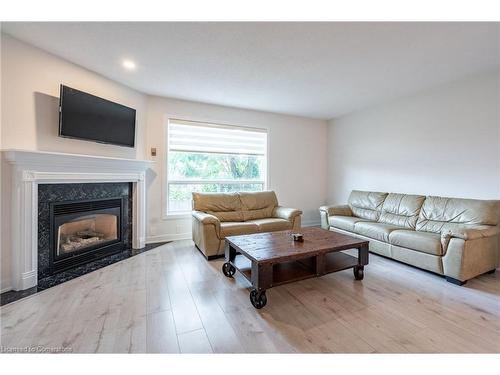 11-384 Limeridge Road E, Hamilton, ON - Indoor Photo Showing Living Room With Fireplace