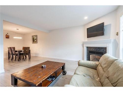 11-384 Limeridge Road E, Hamilton, ON - Indoor Photo Showing Living Room With Fireplace