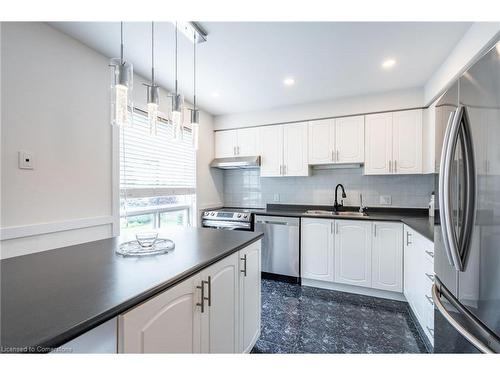 11-384 Limeridge Road E, Hamilton, ON - Indoor Photo Showing Kitchen With Double Sink