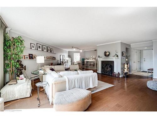 Ph2-150 Wilson Street W, Hamilton, ON - Indoor Photo Showing Living Room With Fireplace