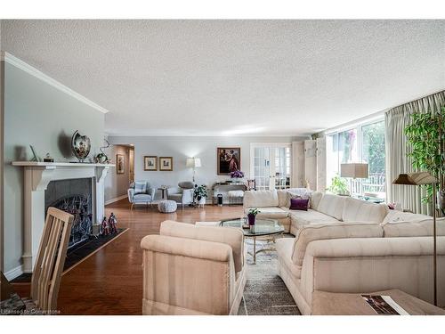 Ph2-150 Wilson Street W, Hamilton, ON - Indoor Photo Showing Living Room With Fireplace