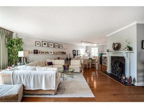 Ph2-150 Wilson Street W, Hamilton, ON - Indoor Photo Showing Living Room With Fireplace