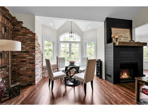 9-60 Dufferin Avenue, Brantford, ON - Indoor Photo Showing Dining Room With Fireplace