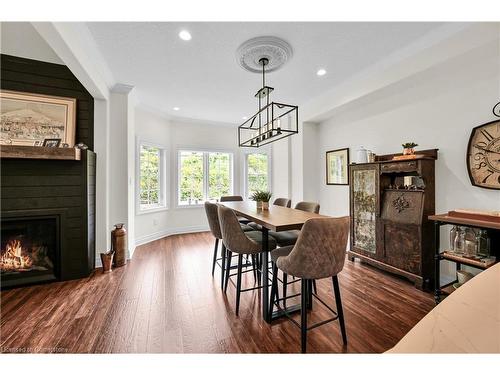 9-60 Dufferin Avenue, Brantford, ON - Indoor Photo Showing Dining Room With Fireplace