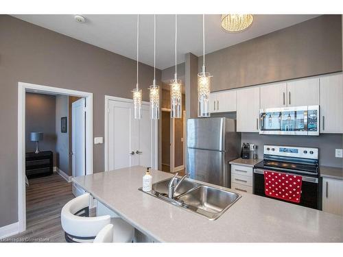 610-16 Concord Place, Grimsby, ON - Indoor Photo Showing Kitchen With Double Sink