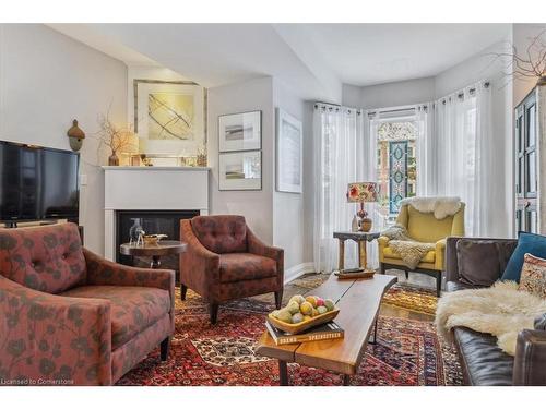 109 Ontario Avenue, Hamilton, ON - Indoor Photo Showing Living Room With Fireplace