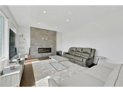 7266 Silver Creek Circle, London, ON - Indoor Photo Showing Living Room With Fireplace