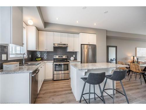 126-1890 Rymal Road E, Stoney Creek, ON - Indoor Photo Showing Kitchen With Stainless Steel Kitchen With Double Sink With Upgraded Kitchen